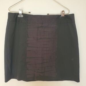 Gap Black low slung mini skirt w/ribbon detail. Back zipper lined Sz 10
